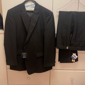 Brand new w tags. Men’s black Tuxedo